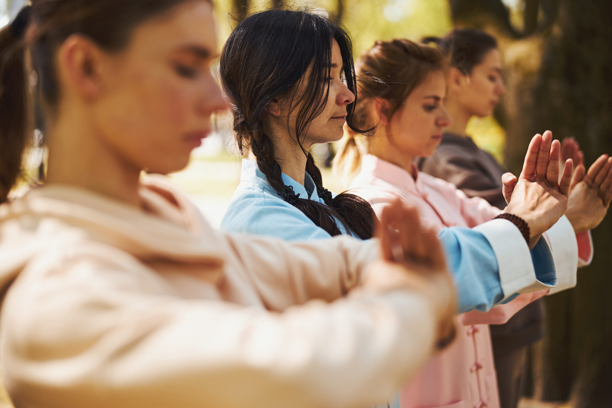 Qigong practice outdoors at sunrise